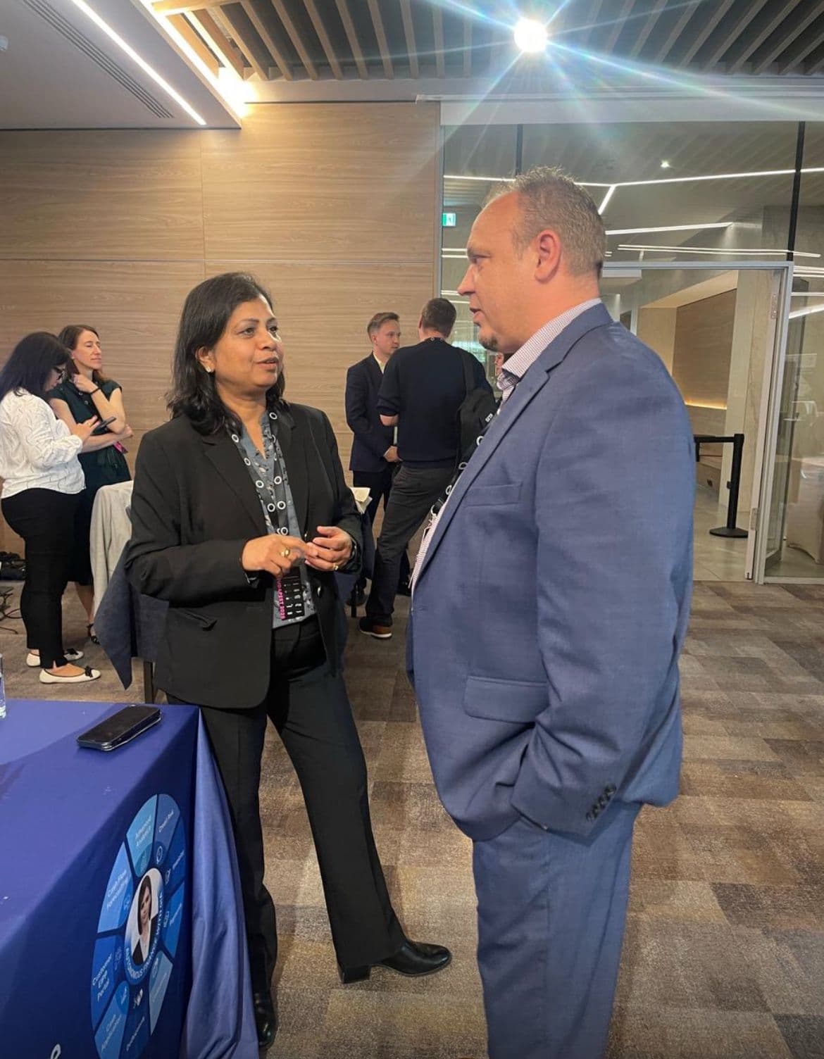 Attendees in conversation during networking